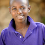 Close-up of a handsome young Haitian teen.